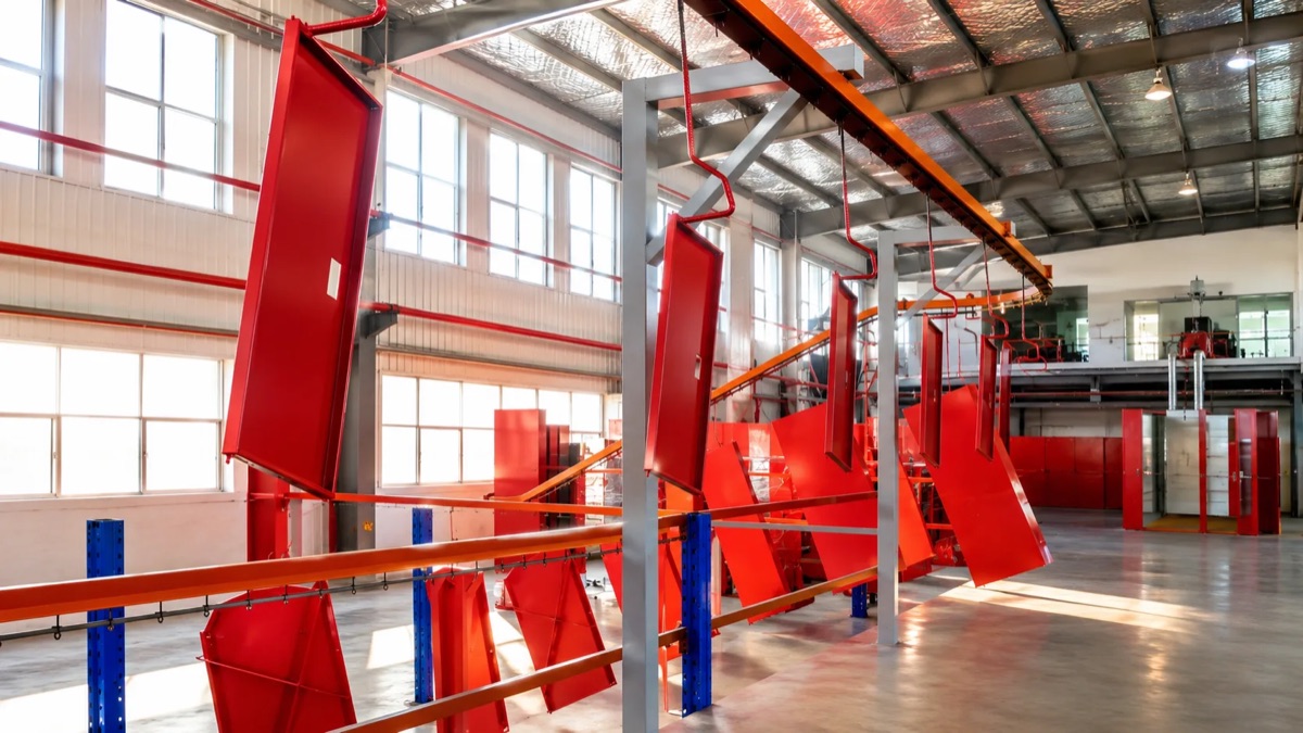 Powder coating line for fire hose boxes